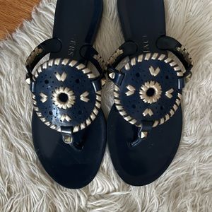 Jack Rogers jelly sandals.